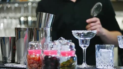 Bartender Preparing Cocktail at Bar