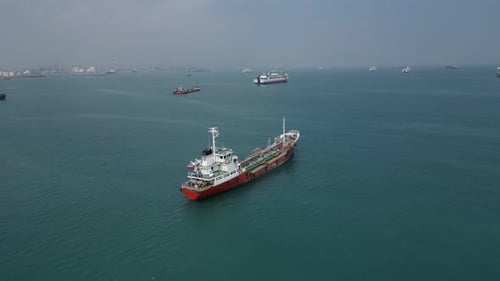 Aerial video above ships moored in Pulau Merak Kecil Indonesia