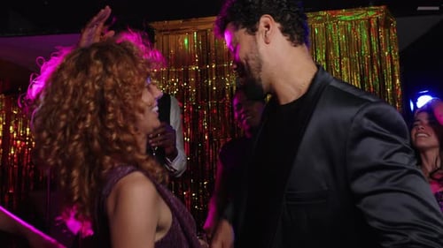 Adults Dancing Together at a Festive Party