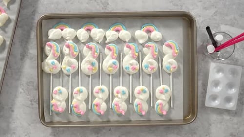 Flat Lay Step By Step Decorating Freshly Baked Unicorn Meringue Pops Cookies