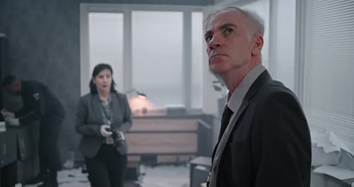 Office Robbery Case Female Forensic Scientist Takes Photos of Evidence Then Talks to Male Detective