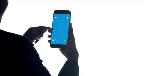 Green screen, phone and hands in studio scroll for business website, online info and internet