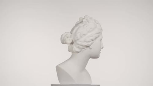 Closeup Shot Ancient Marble Bust Statue of Roman Era Woman Spinning Round on a Platform Isolated on