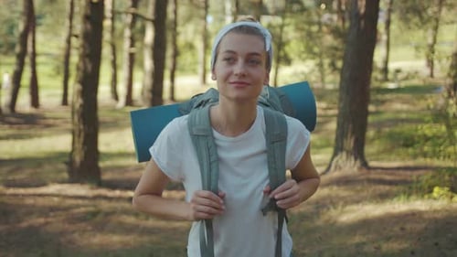 Portrait Woman Tourist with Backpack Walking in the Fall Forest on Sunny Summer Day Smile Look