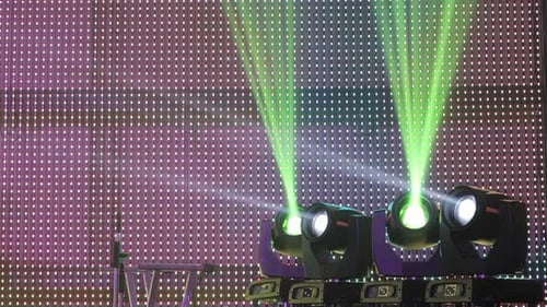 Night Club Stage Lights Projectors In Front Of A Led Wall