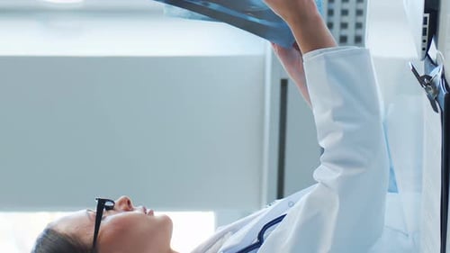 Professional Medical Doctors Working in Hospital Office Making Computer Research Medicine Healthcare