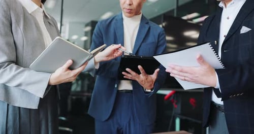 Japanese, people and meeting with documents in office for finance report