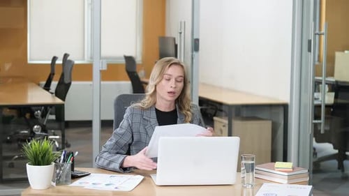 Professional Woman Working in a Modern Office