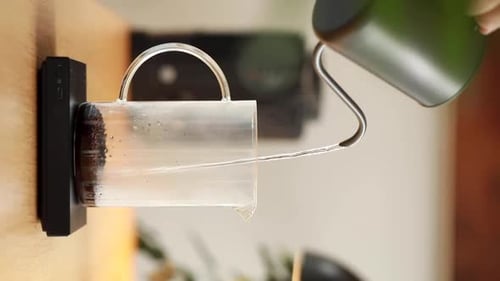 Pouring Hot Water for Coffee Brewing