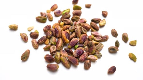 Healthy Pistachio Nuts Rotating View On White Table Background