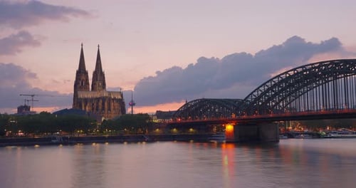 A Church and a Bridge Next to a River in Berlin Germany at Dusk Timelapse