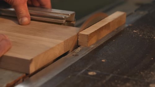 Saw Cutting Wood in a Carpentry Workshop