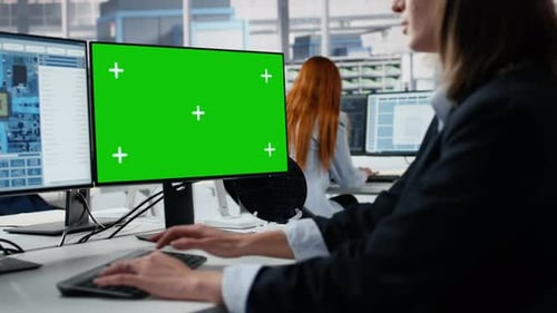 Mockup Green Screen PC Used By Woman in Microchip Factory Office