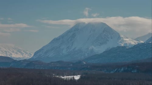 Clouds moving over mountain in the valley of Alaska