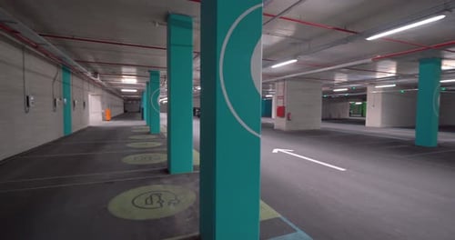 Modern Underground Electric Vehicle Charging Station and Empty Smart Parking Garage