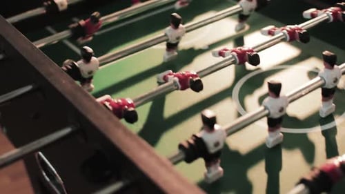 Table Football Game with Red and Black Players