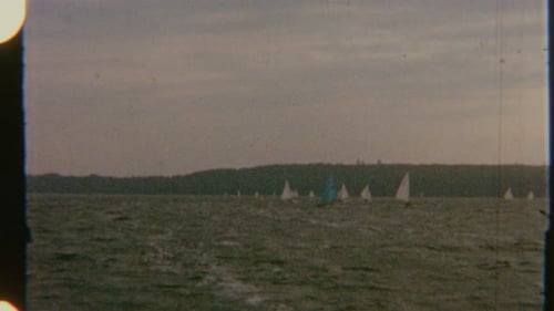 Vintage Boats Sailing on Water in 1950s