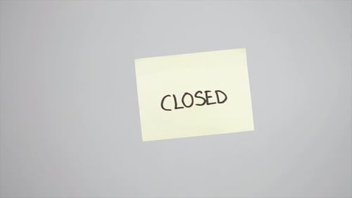 Hand Places a Closed Sticky Note