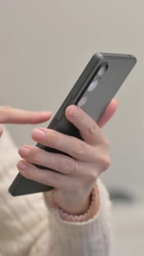 Close up of Woman Browsing Smartphone