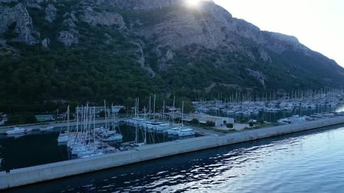 Beautiful view of the beach with boats, pure nature, sea and ships. Shot from a drone
