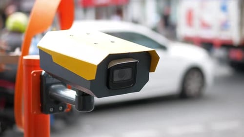 Security Camera on Street Monitoring Urban Traffic