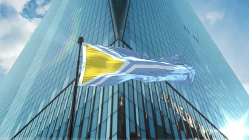 Geometric Corporate Flag Waving Before Modern Skyscraper
