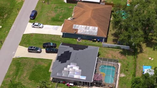 Florida Home with Outside Lanai Enclosure Over Large Swimming Pool Concept of Outdoor Living and