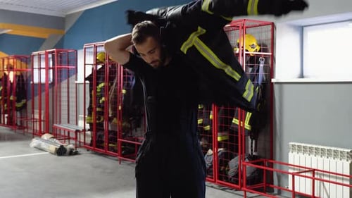 Fireman Changing Clothes in Fire Department