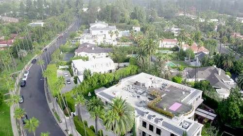 Drone Low View Over Beverly Hills Neighborhood Luxury Mansion, Villa, Homes with Swimming Pools, Te