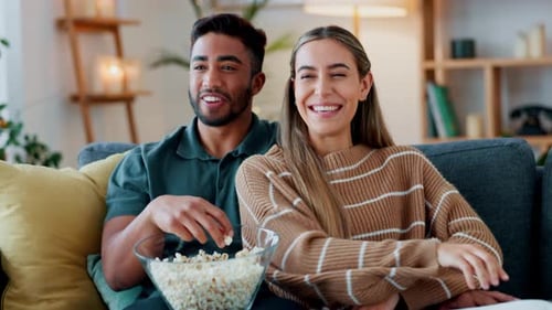 Loving Couple Relaxing at Home Watching Movie