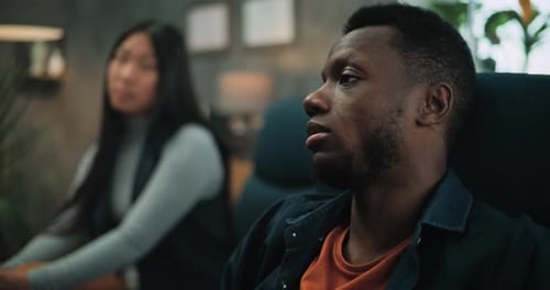 Close Up of African American Man Discussing Relationship Problem with Girlfriend