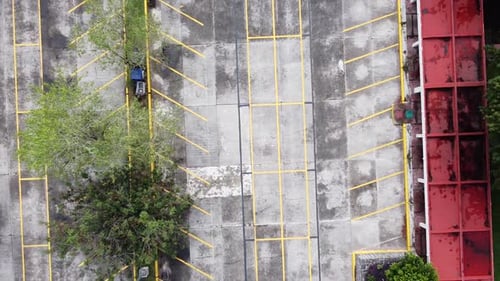 Empty, desolate and deserted aerial view directly above parking lot at National Autonomous Universit