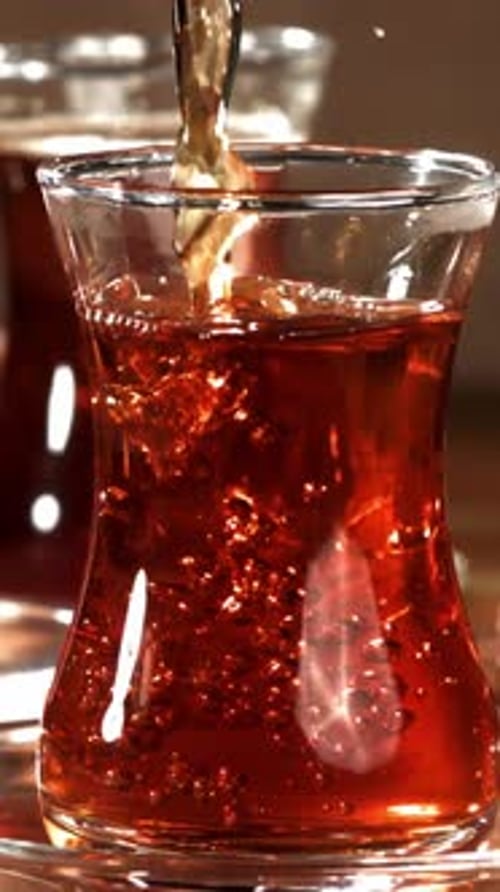 Turkish Tea is Poured Into a Glass Filmed on a Highspeed Camera at 1000 Fps