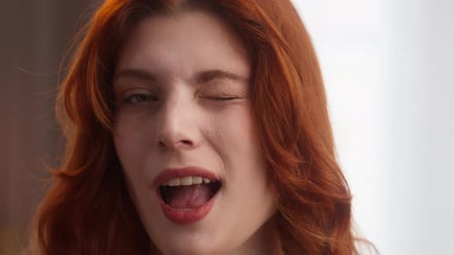 Attractive Happy Caucasian Woman Close Up Carefree Female Pretty Lady Look at Camera Winking Playful