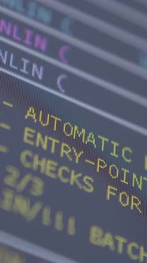 Close-Up of Code Screen Highlighting Automatic System Processes