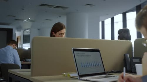 Confident Businesswoman Working Laptop Computer at Office Workplace. Female Employee Answering Phone