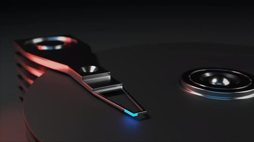 Hard drive with spinning platter. Open computer hard disk.