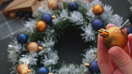 Festive Wreath Crafting with Christmas Ornaments and Glue
