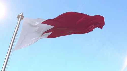 Realistic 3D Bahrain Flag Waving Against Blue Sky