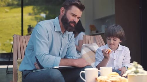 Father and Little Son Sitting on Terrace Near Beautiful Modern House Goodlooking Dad with Beard