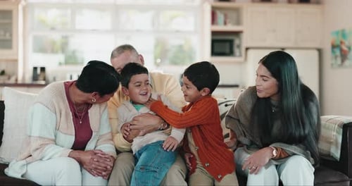 Family Bonding on Couch Together in Living Room