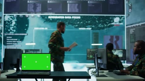 Military IT Specialist in Command Center Working on Collecting Field Data