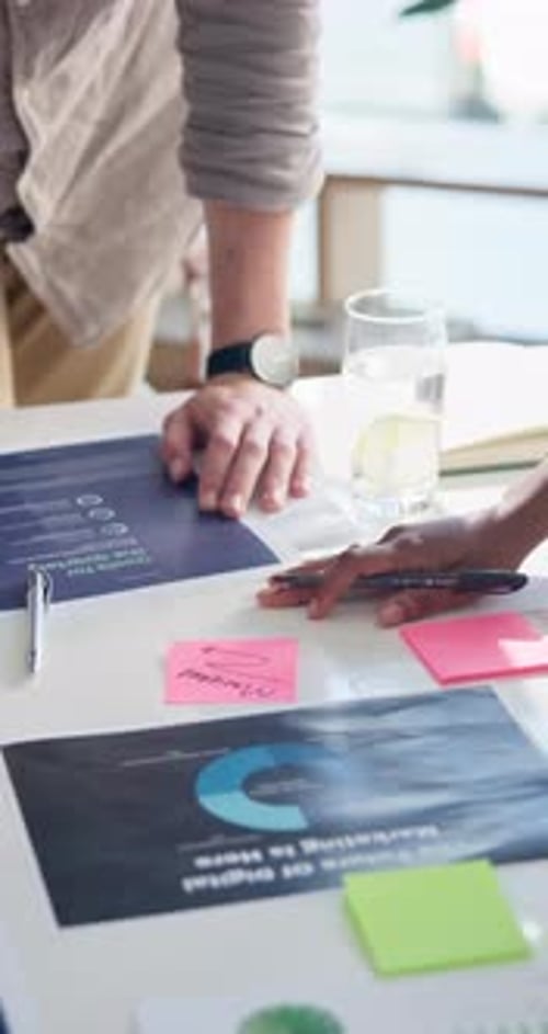 Hands, brainstorming and business people in office, sticky note and review for annual goals