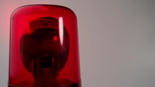 Red rotating beacon. Red flashing light. Warning signal.