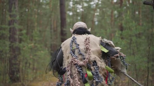 Animator in Monster Costume Runs Away in Forest