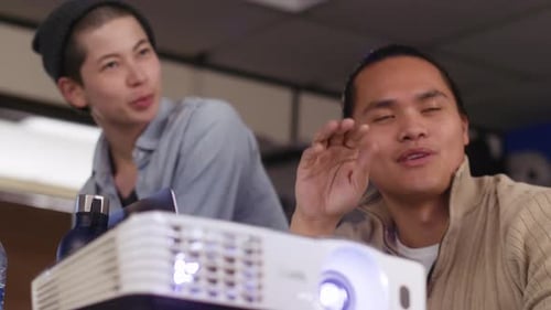 Smiling Computer Programmers Talking During Hackathon 2529 Years