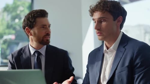 Smiling Business Colleagues Videocalling Laptop Modern Cafeteria Table Closeup