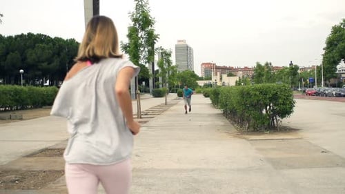 People Running In City