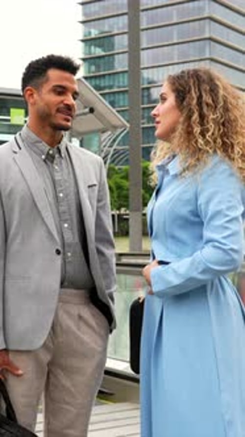 Professional Business Colleagues Talking in Modern City