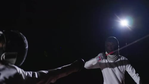 Two Swordsmen Fighting With Foils Or Epees On Fencing Track Slow Motion Training And Workout